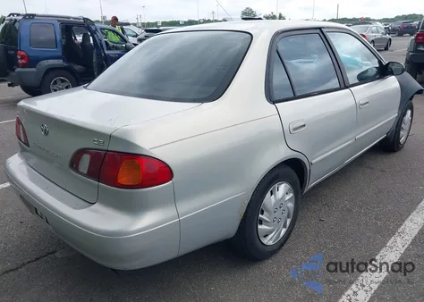 1999 Toyota Corolla Ce z USA, uszkodzony, nr VIN 2T1BR12E9XC180124